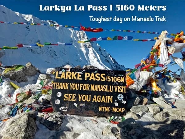 Trekkers crossing the challenging trail of Larkya La Pass during the Manaslu Trek