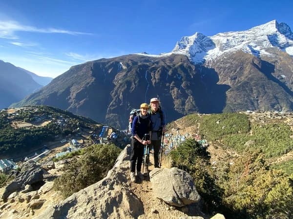 Hikers trekking through the Everest foothills trail